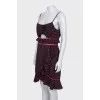 Dress with thin straps in a small print