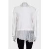 Jumper decorated with a transparent frill