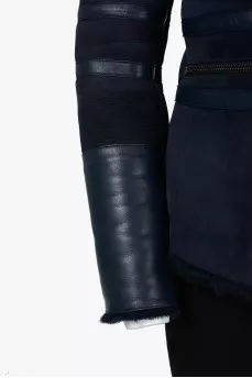 Short sheepskin coat with asymmetrical zipper