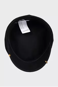 Wool cap with a gold logo