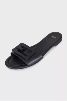 Black leather flip-flops with brand logo