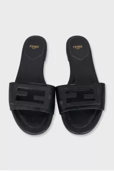 Black leather flip-flops with brand logo
