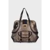 Gold leather tote with patch pockets