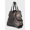 Gold leather tote with patch pockets