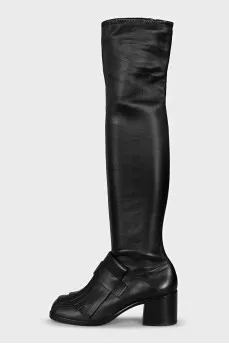 Black over-the-knee boots with leather tassels