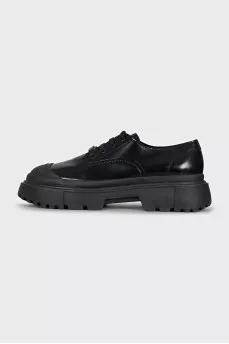 Black brogues with rubber toes