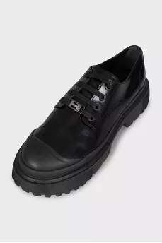 Black brogues with rubber toes