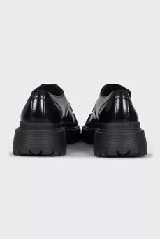 Black brogues with rubber toes