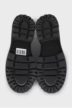 Black brogues with rubber toes