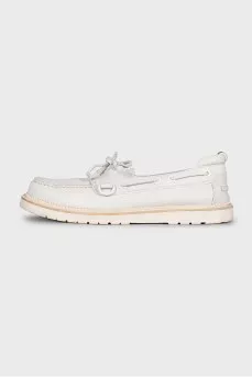 Men's leather loafers decorated with laces