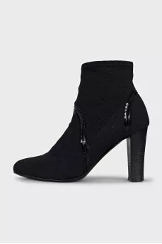 Ankle boots with perforated heels