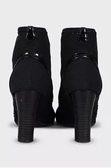 Ankle boots with perforated heels