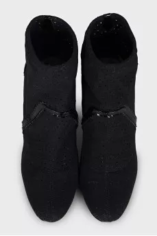 Ankle boots with perforated heels