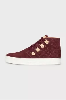 High-top suede sneakers with signature embossing