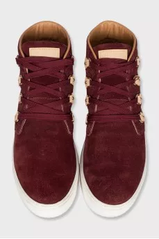 High-top suede sneakers with signature embossing