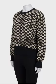 Sweater with a signature print