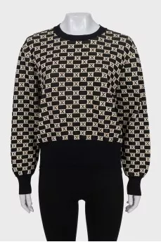 Sweater with a signature print