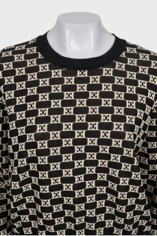 Sweater with a signature print