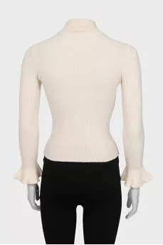 Wool turtleneck with puff sleeves