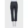 Gray capri pants with a distressed effect