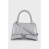 Hourglass embossed leather bag