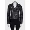 Black leather jacket with silver hardware and tag