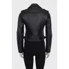 Black leather jacket with silver hardware and tag