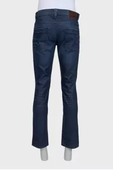 Men's dark blue jeans with decoration