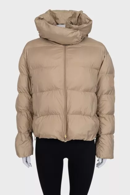 Beige down jacket with a hood