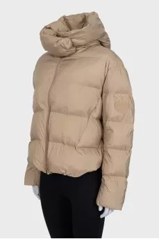 Beige down jacket with a hood