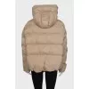 Beige down jacket with a hood