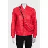 Red demi-season jacket with a zipper
