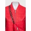Red demi-season jacket with a zipper