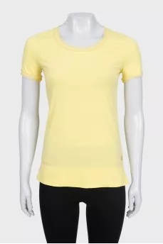 Yellow T-shirt with decoration
