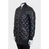 Long black down jacket with a zipper