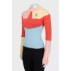 Multicolored jumper with airplanes