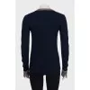Pullover with contrasting buttoned cuffs