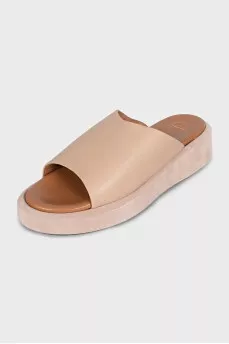 Beige leather flip-flops with high soles