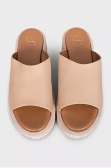Beige leather flip-flops with high soles