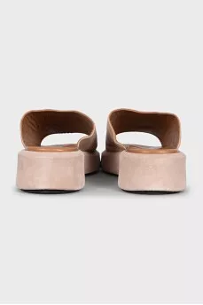 Beige leather flip-flops with high soles