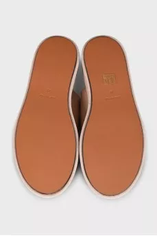 Beige leather flip-flops with high soles