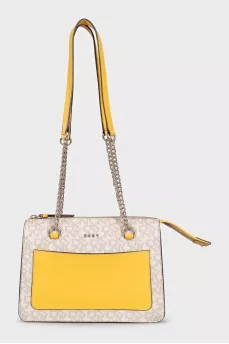 A bag with combined printed handles