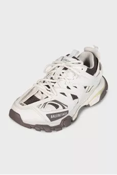 White sneakers with a chunky sole Track