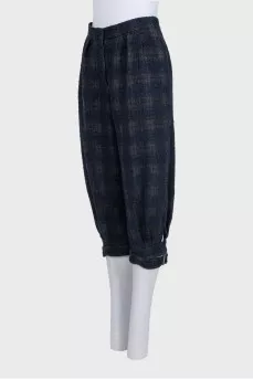 Blue tapered capri pants in a plaid print