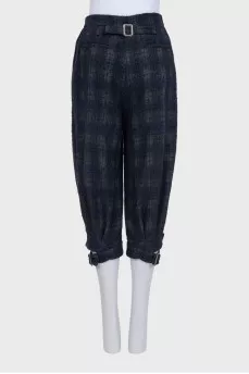 Blue tapered capri pants in a plaid print