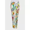 Low-waist trousers with a bright print