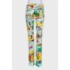 Low-waist trousers with a bright print