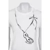 Beige T-shirt decorated with sequins