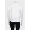 Beige T-shirt decorated with sequins