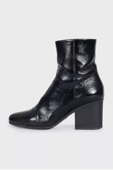 Black leather boots with heels